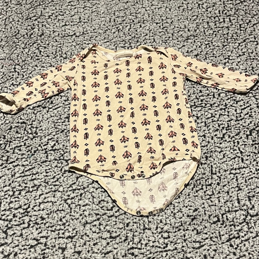 Spell- little gypsies cream tribal long sleeved onesie